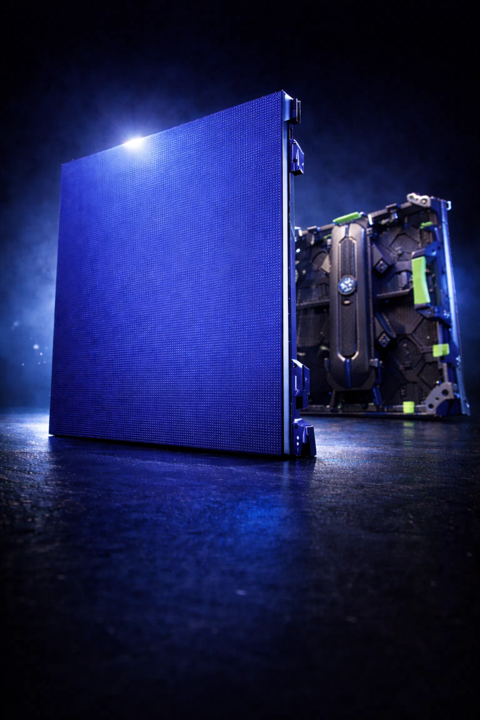 Close-up of a professional P2.9 indoor LED wall panel from Foresight Productions. The image highlights the high-density front LED surface and the precision-engineered rear cabinet with modular construction, easy-grip handles, and secure locking hardware. The metallic sheen and technical clarity reflect high-end hardware quality.